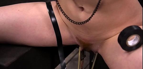  Redhead on device bondage is toyed